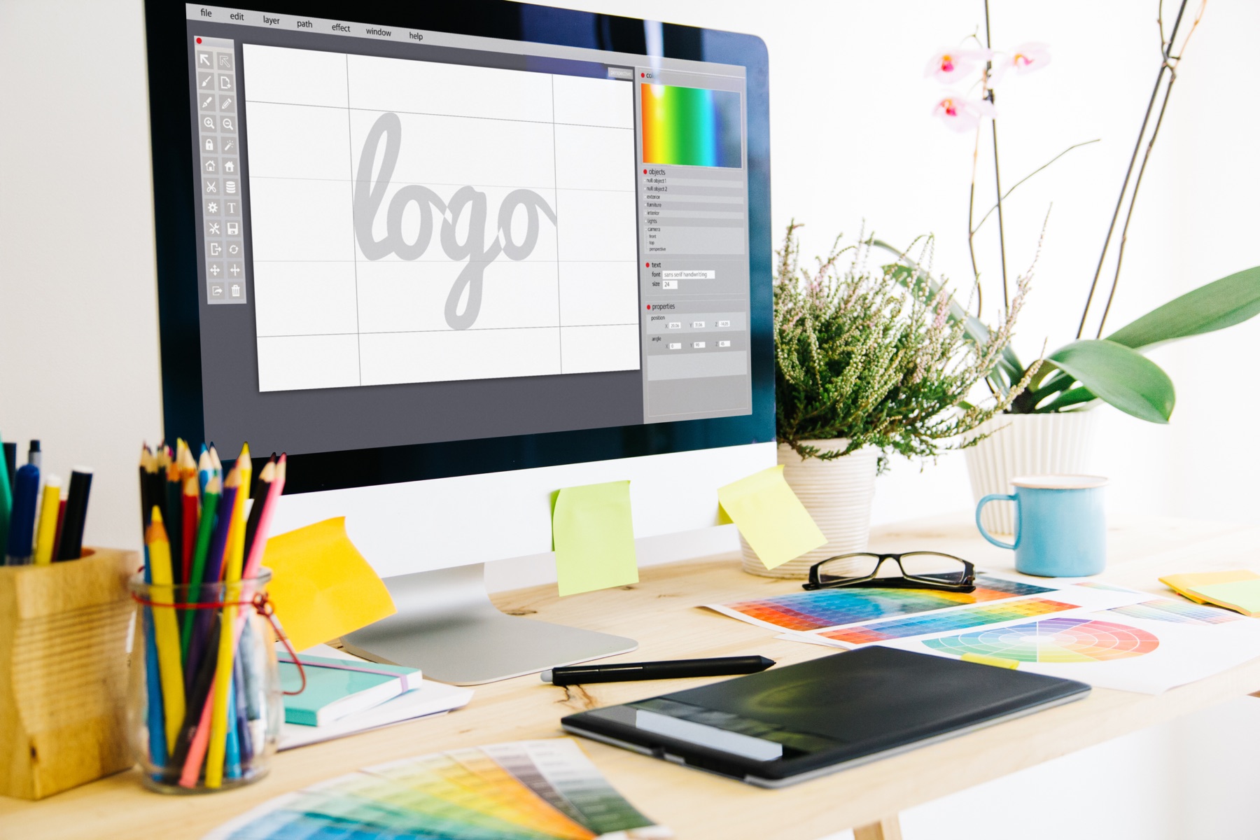 Logo being developed on a designer's screen